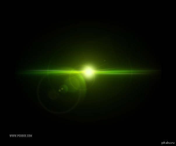 Светящаяся точка на экране. Зеленый блик. Зеленое свечение. Эффект свечения. Зеленые блики на черном фоне.